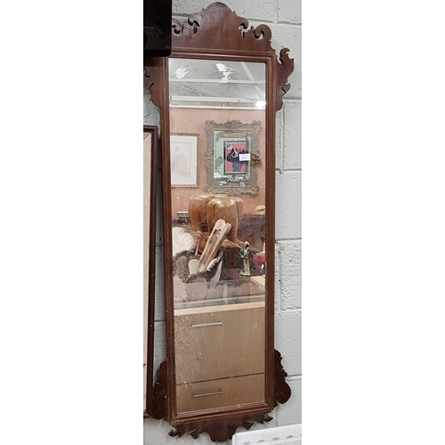 518 - A late 19th early 20th Century Mahogany Wall Mirror. 30 x 109 cms.