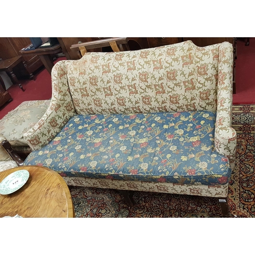 586 - A 19th Century Mahogany two seater Couch in the Georgian style. 145cm long.