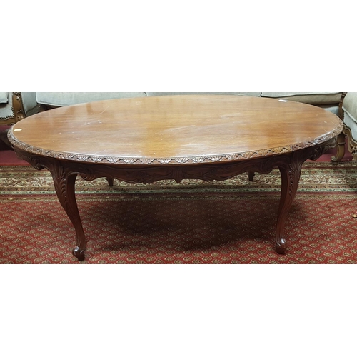 601 - A Mahogany Oval Coffee Table. Approx H43 x W121 x D77.