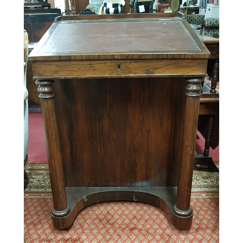 609 - A really good 19th Century Rosewood Davenport with fitted top drawer and interior and with turned fr... 