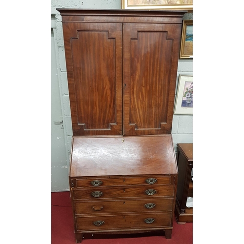 687 - A Georgian Mahogany Bureau Bookcase with a blind panelled top. W96cm X D56cm x 210 cms H approx.