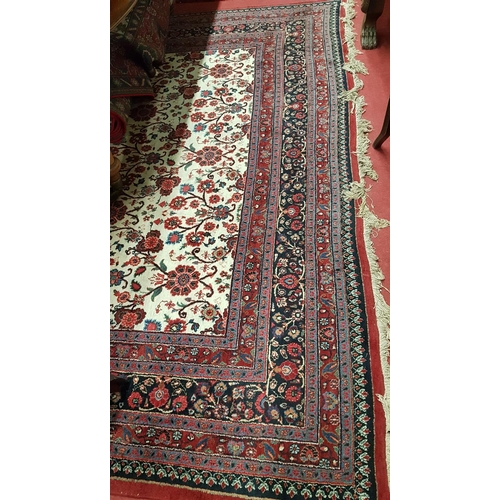 660 - A good Burgundy Ground Rug with multi borders and allover decoration.