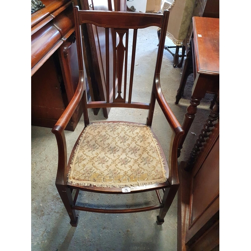 176 - An Edwardian Mahogany and Inlaid Armchair.