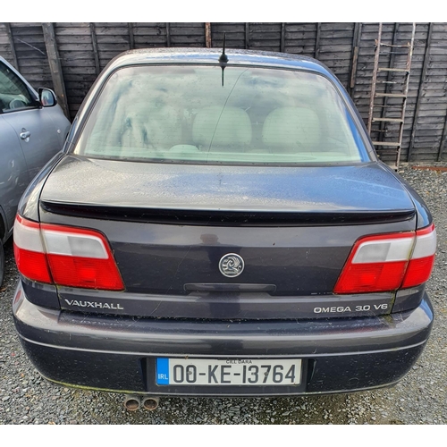 2 - A 2000 Vauxhall Omega 3.1 V6. Automatic with cream leather seats. No paperwork.