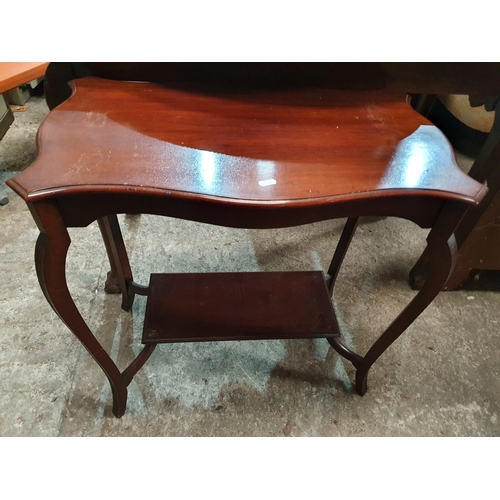 282 - A Mahogany Veneered Corner Cabinet, a Mahogany Hall Table, a centre table and a mirror.