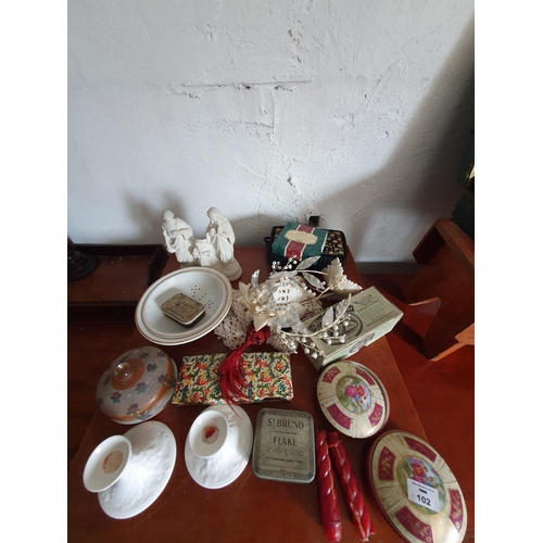 102 - A pair of 19th Century Pottery Candlesticks along with other Items on the mantle.