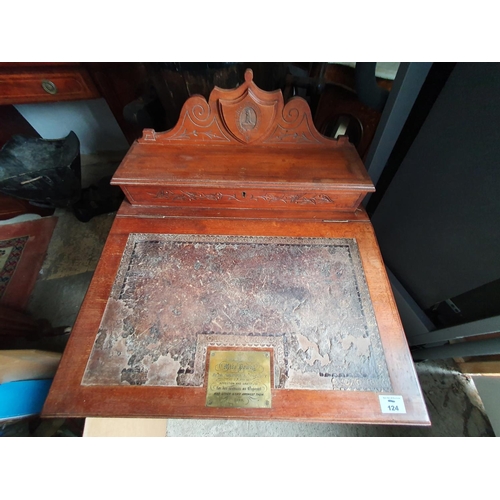 124 - A 19th Century Walnut Davenport with a brass plaque stating 'Presented to Mrs Powell' and dated 1888... 