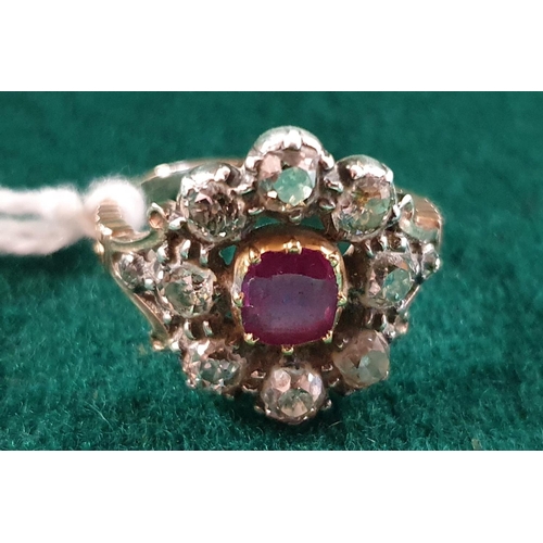 13 - An early Victorian Ruby and Diamond cluster Ring set in rose gold. Approx diamond weight 1.5 - 2cts.... 