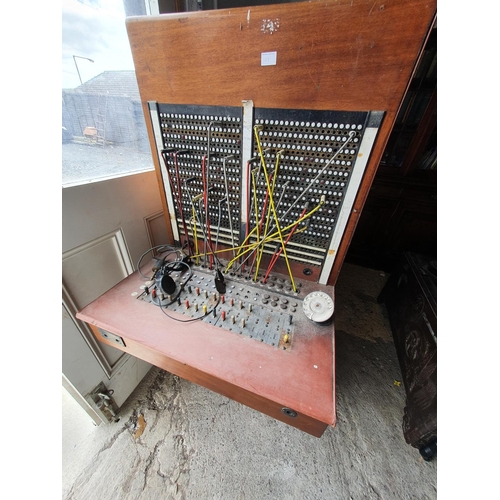 137 - A very unusual and rare free standing Telephone Exchange. 143 h x 70 w x  66 d cms.