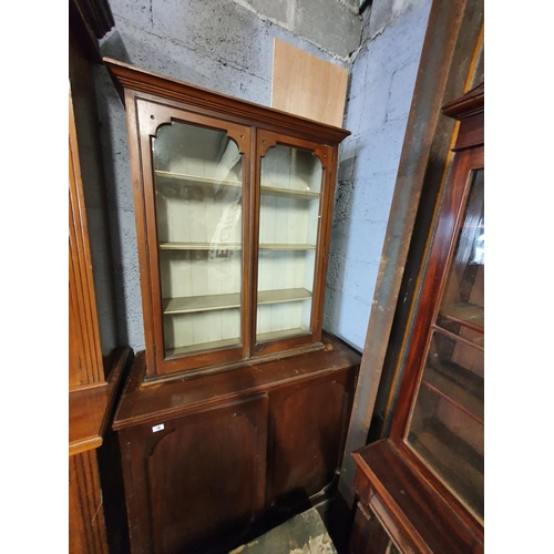 155 - A two door Bookcase.