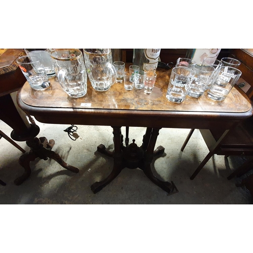 160 - A 19th Century Walnut and Burr Walnut foldover Card Table on quatrefoil base (top with faults). W 96... 