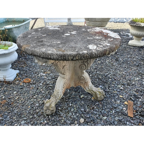 22 - A reconstituted Stone or heavy Stone circular Table.