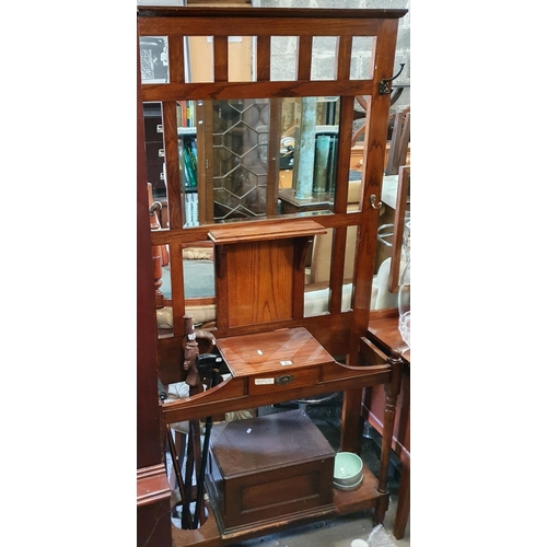 244 - An early 20th Century Oak Coat Stand.