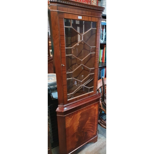 259 - A Mahogany Veneered Corner Cabinet.