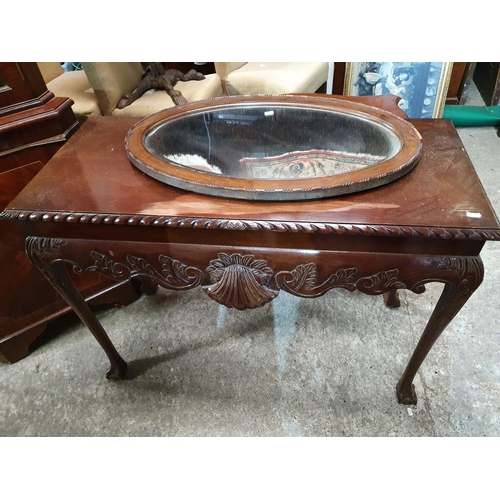 282 - A Mahogany Veneered Corner Cabinet, a Mahogany Hall Table, a centre table and a mirror.