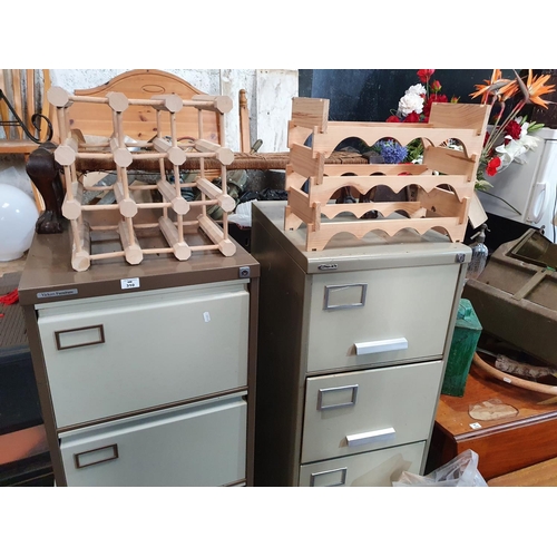 310 - Two Filing Cabinets along with two wine racks and a stool.