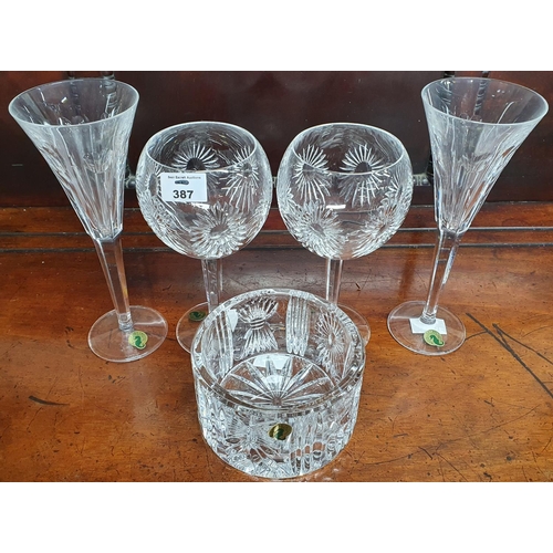 387 - A good pair of Waterford Millenium Heather Goblets, a pair of Waterford flutes along with a Waterfor... 