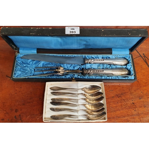 393 - A 19th Century French Carving Set and a set of plated spoons.