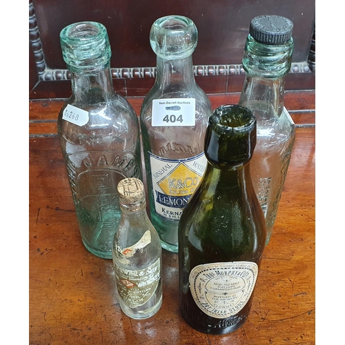 404 - A Kernan & Co Lemonade Bottle, An R Perry & Sons Ltd of Rathdowney Bottle with original stopper, a T... 