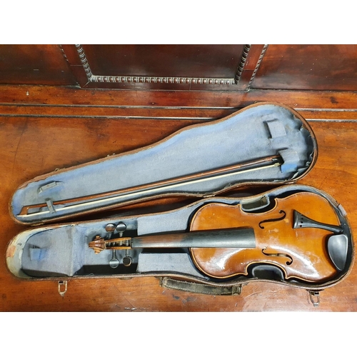 409 - A 3/4 size Violin with a nice tiger grained back, with bow in a timber case.