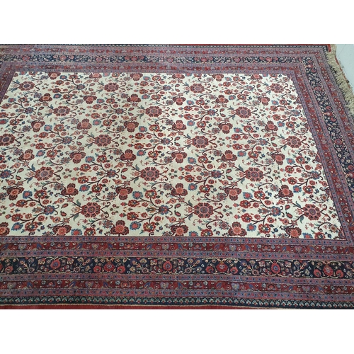 660 - A good Burgundy Ground Carpet with multi borders and allover decoration. 335 x 255 cms.