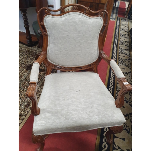 638 - The property of The 5 star Hotel in London. A good Hardwood Armchair with upholstered back and arms ... 