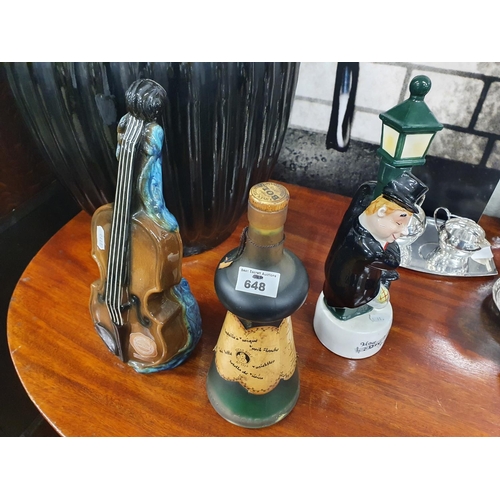 648 - Three Musical Spirit Decanters.