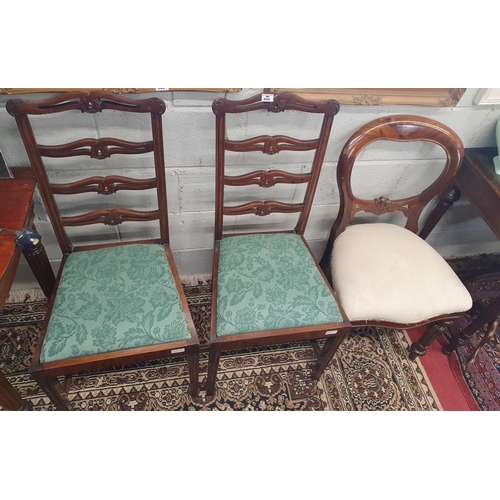 656 - A good pair of 19th Century Ladderback Chairs along with a 19th Century balloon back chair.