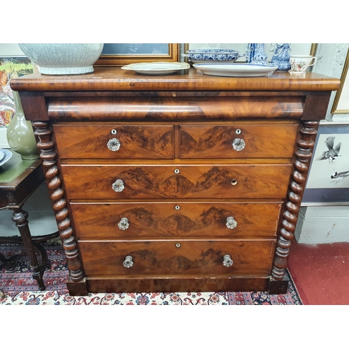 673 - A Victorian Mahogany Chest of Drawers with glass knobs.