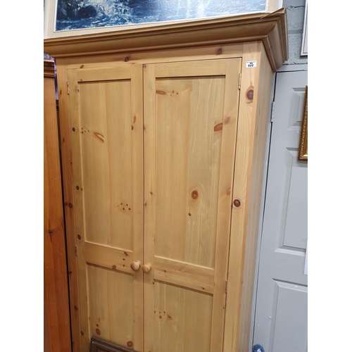 922 - A Pine two door Wardrobe. 197 H x 103 W x 66 cms D.