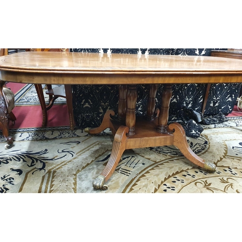 930 - A Fantastic large Regency Mahogany Breakfast Table, the rectangular crossbanded tilt top upon four t... 