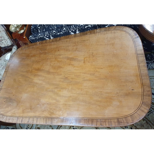 930 - A Fantastic large Regency Mahogany Breakfast Table, the rectangular crossbanded tilt top upon four t... 