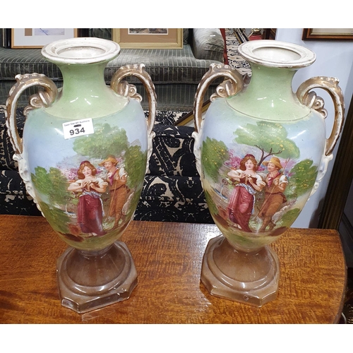 934 - A good pair of transfer decorated urn shaped Vases.