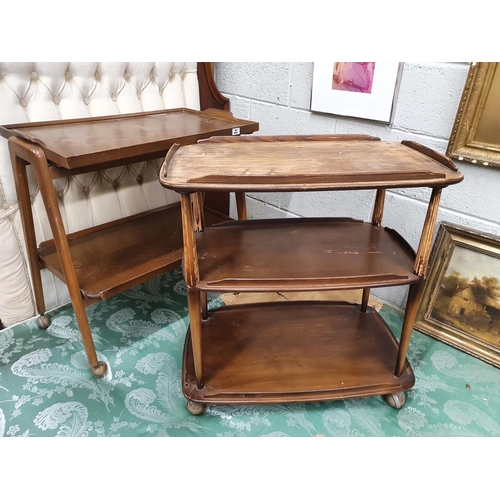 946 - An Ercol three tier Dumbwaiter along with an Ercol style tray top waiter.