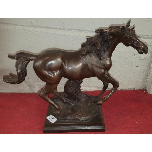 507 - A good Bronze Sculpture of a Horse. Makers name indistinct. 31 x 40cm.