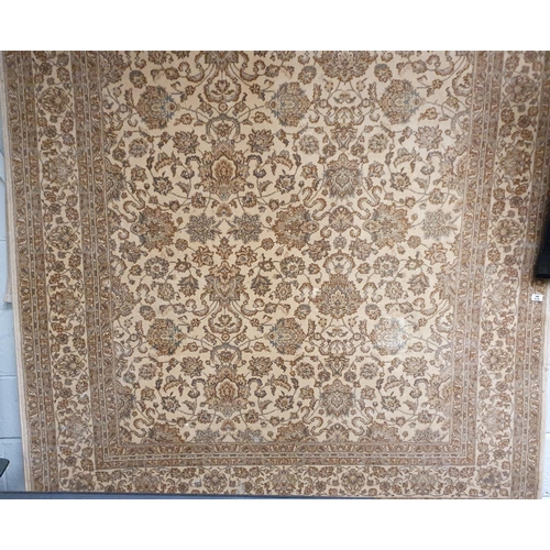 516 - A Royal Keshan machine made cream ground Rug. 240 x 170cm