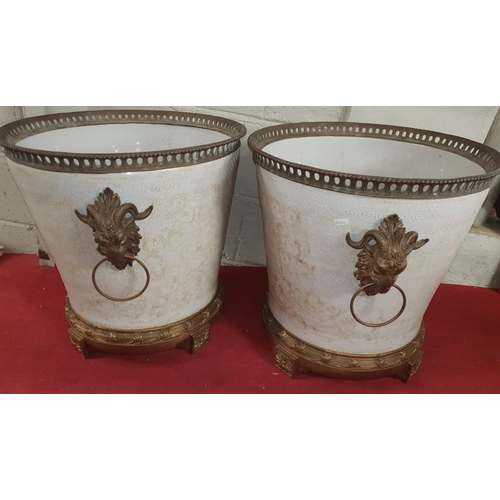 521 - The property of the 5 star Hotel in London. A fantastic pair of large Ceramic Pots with brass rams h... 