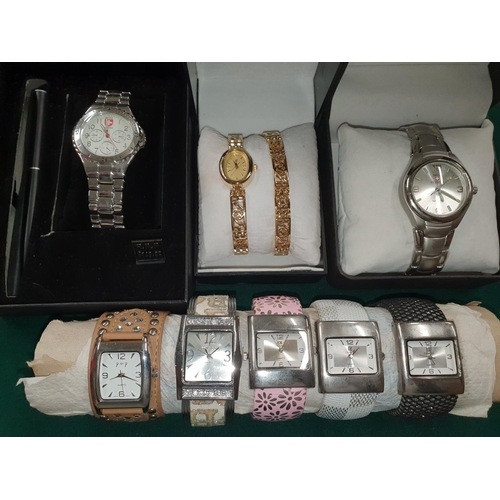 536 - Two Swiss made wrist Watches along with others.