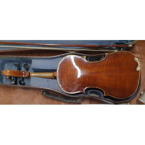 409 - A 3/4 size Violin with a nice tiger grained back, with bow in a timber case.