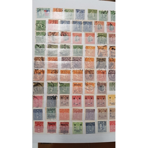 583b - A large stock book of Chinese Stamps.