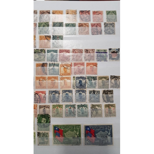 583b - A large stock book of Chinese Stamps.