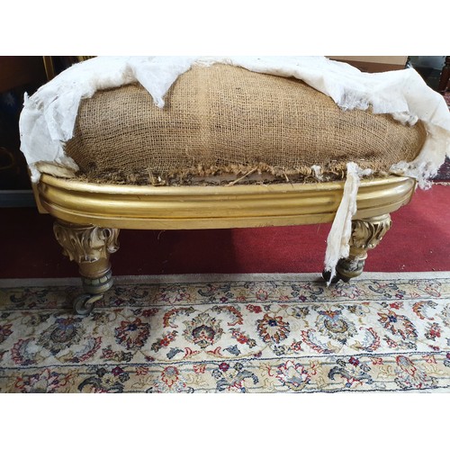 414 - A really good 19th Century Gilded Chaise Lounge with acanthus leaf decoration on turned carved feet.