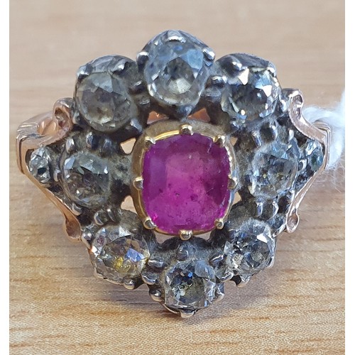 13 - An early Victorian Ruby and Diamond cluster Ring set in rose gold. Approx diamond weight 1.5 - 2cts.... 