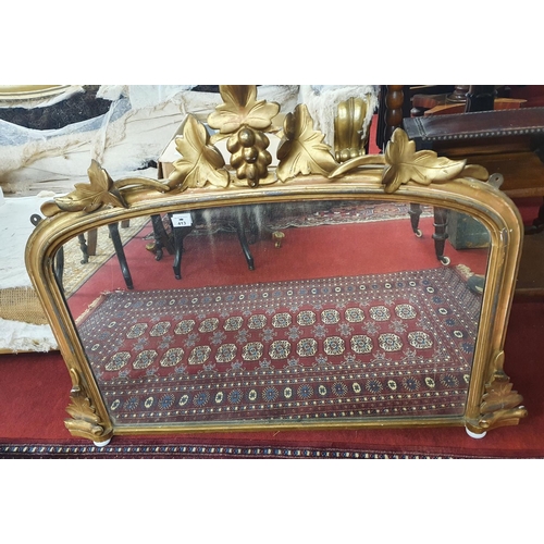 413 - A 19th Century Timber Gilt Overmantle Mirror with original gilt.