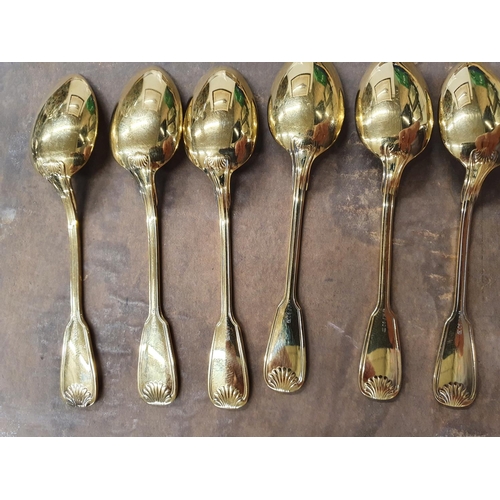 16 - A good set of six gold plated continental silver Tea Spoons.