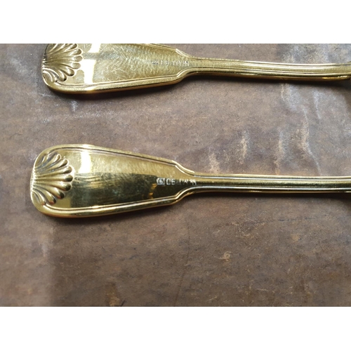 16 - A good set of six gold plated continental silver Tea Spoons.