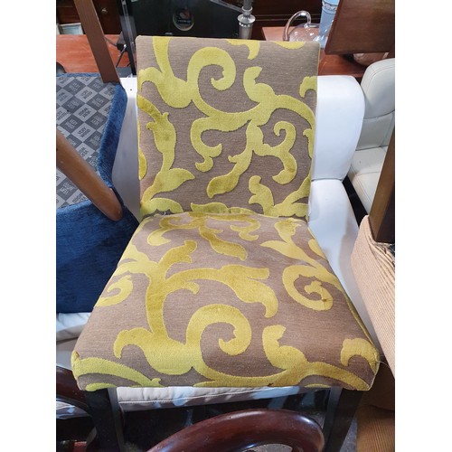 240 - A well upholstered Tub Chair along with another chair in the same fabric.