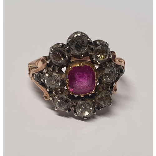 13 - An early Victorian Ruby and Diamond cluster Ring set in rose gold. Approx diamond weight 1.5 - 2cts.... 