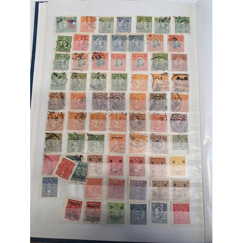 583b - A large stock book of Chinese Stamps.