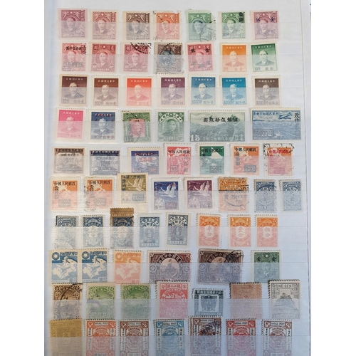 583b - A large stock book of Chinese Stamps.